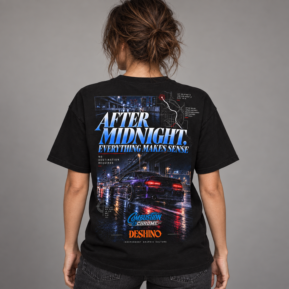 A woman shown from behind wearing a black graphic t-shirt with a large back print featuring a neon-lit car and the text 'AFTER MIDNIGHT. EVERYTHING MAKES SENSE.