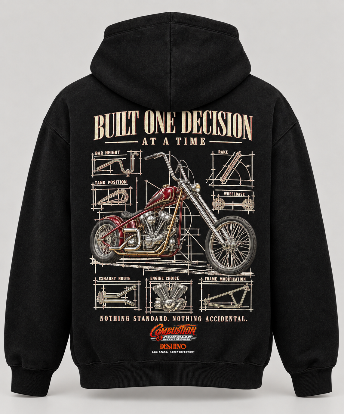 Black pullover hoodie shown from the back, featuring a large motorcycle blueprint-style graphic with the text 'BUILT ONE DECISION AT A TIME' and smaller technical drawing elements. The hoodie is photographed on a light gray studio background.