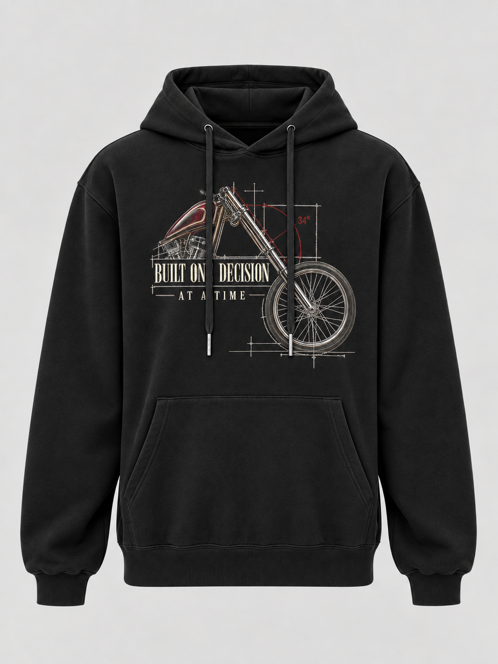 A black pullover hoodie with a front graphic of a vintage motorcycle rendered like a technical blueprint, featuring the text 'BUILT ONE DECISION AT A TIME'.