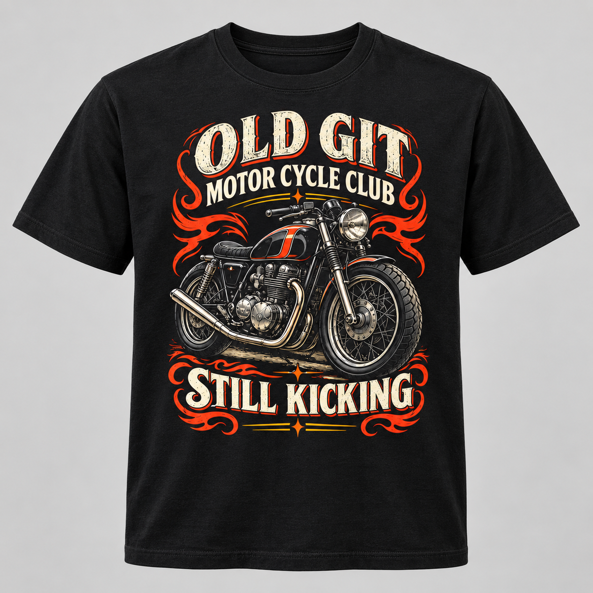 A black short-sleeve graphic t-shirt featuring a vintage-style motorcycle illustration with the text 'OLD GIT MOTOR CYCLE CLUB' and 'STILL KICKING' in cream and orange lettering, set against a plain gray background.