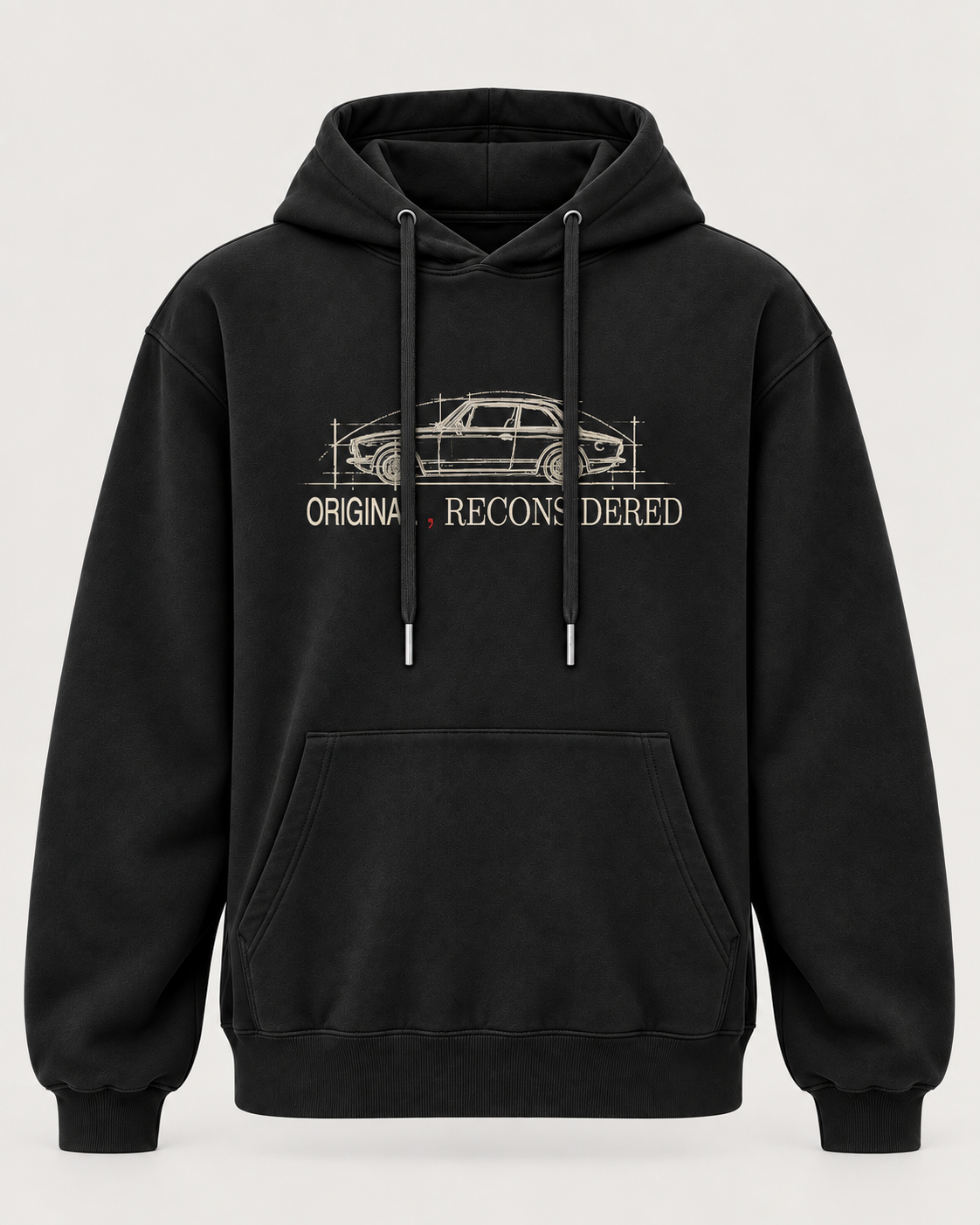 A black pullover hoodie with a front kangaroo pocket and drawstrings, featuring a white line-art car graphic and the words 'ORIGINAL RECONSIDERED' printed on the chest, shown against a light gray background.